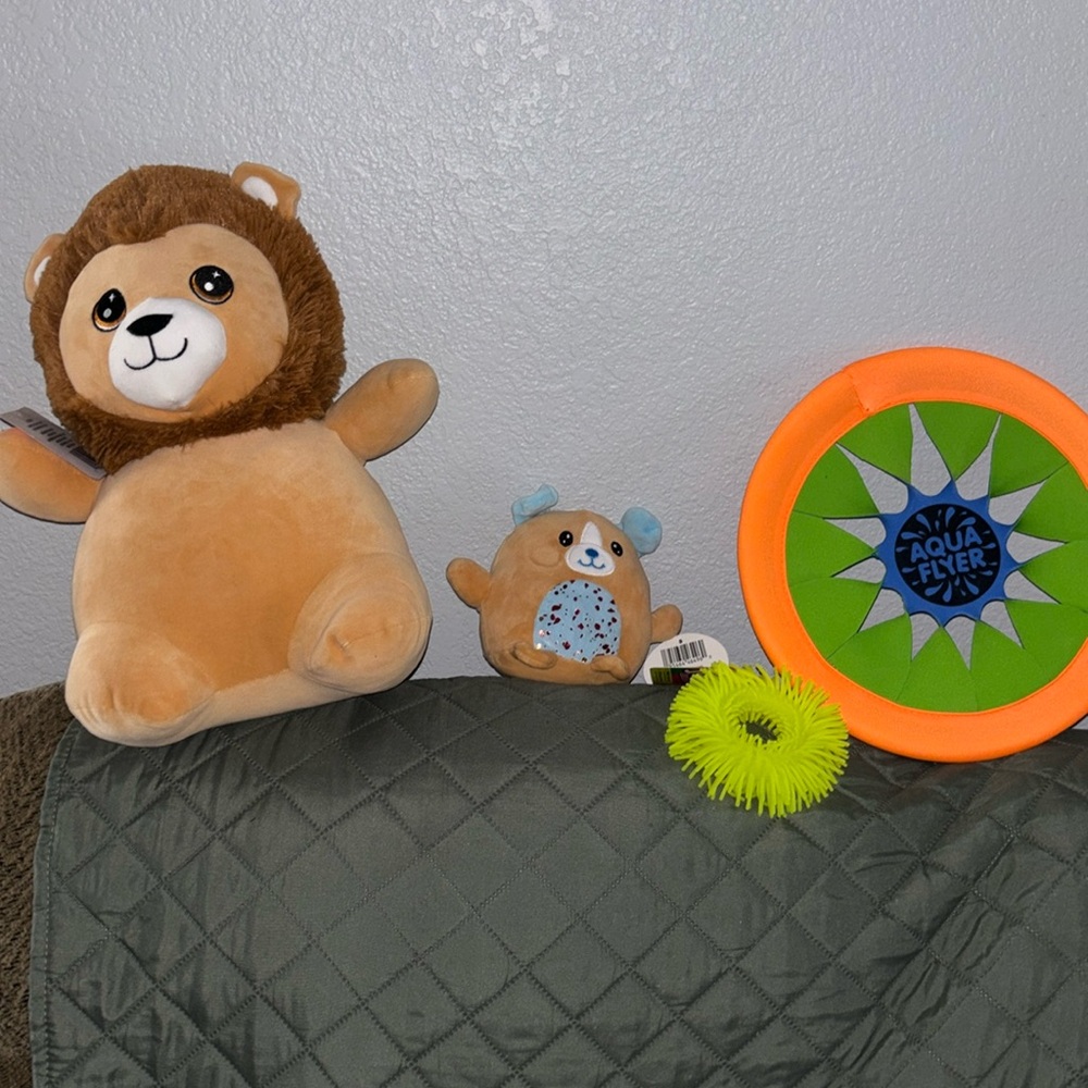 children’s toys 14” plush lion, jiggly neon yellow bracelet, aqua flyer 12”